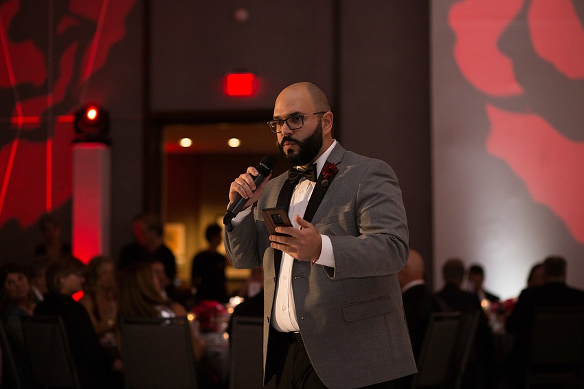 Roger Capote tells the audience about CAN's mission.