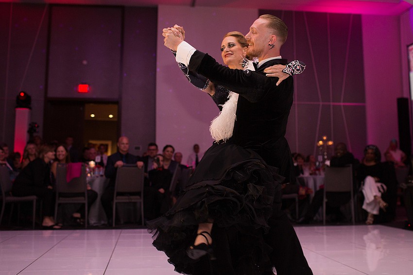 Dr. Cathleen McCabe performed a graceful ballroom routine.