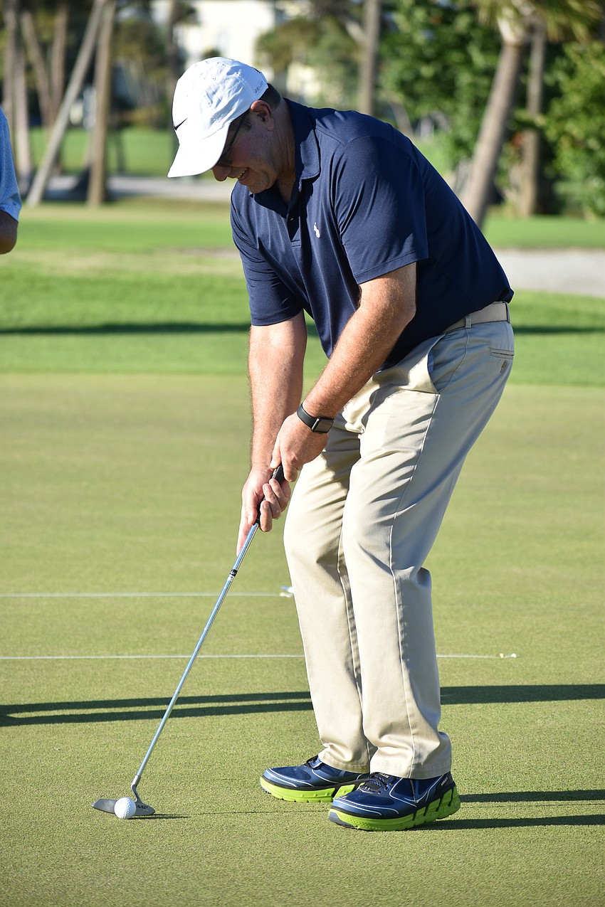 Town Manager Tom Harmer takes his turn.