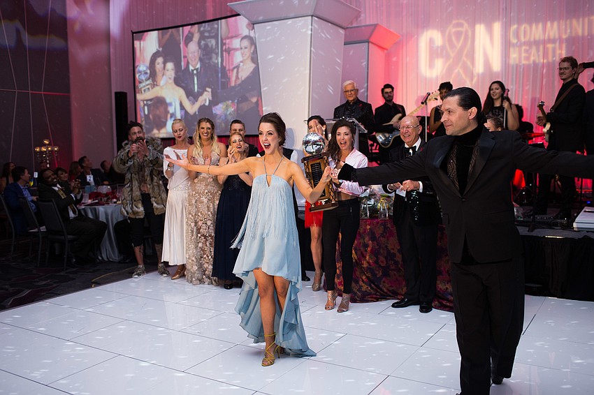 Monica Kelly smiles as she is called up as the winner of the dance competition.