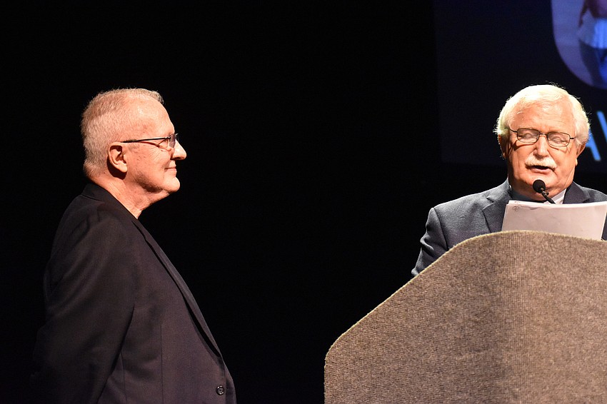 Arts Leadership Award — Volunteer Winner David Schuler listens to Arts and Cultural Alliance of Sarasota County Executive Director Jim Shirley introduce him.