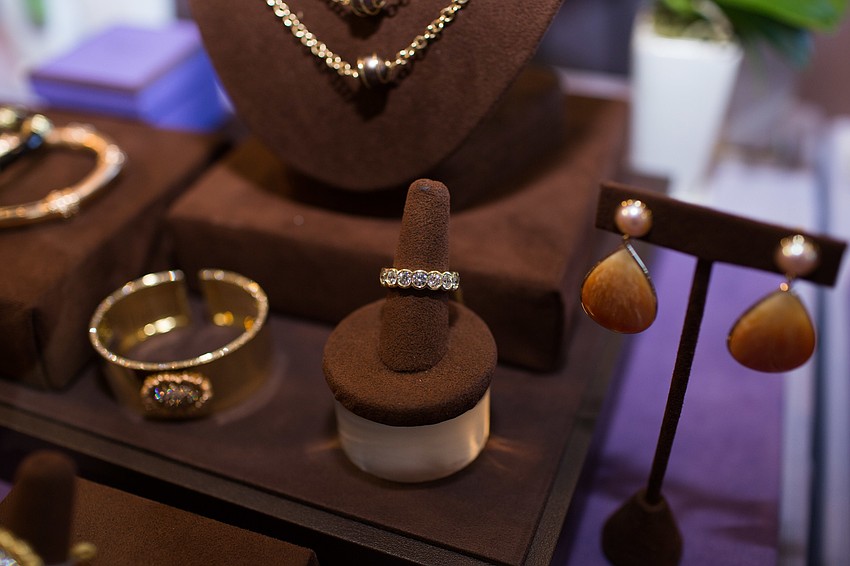 A variety of jewelry was on display and for sale for guests to browse before the luncheon.