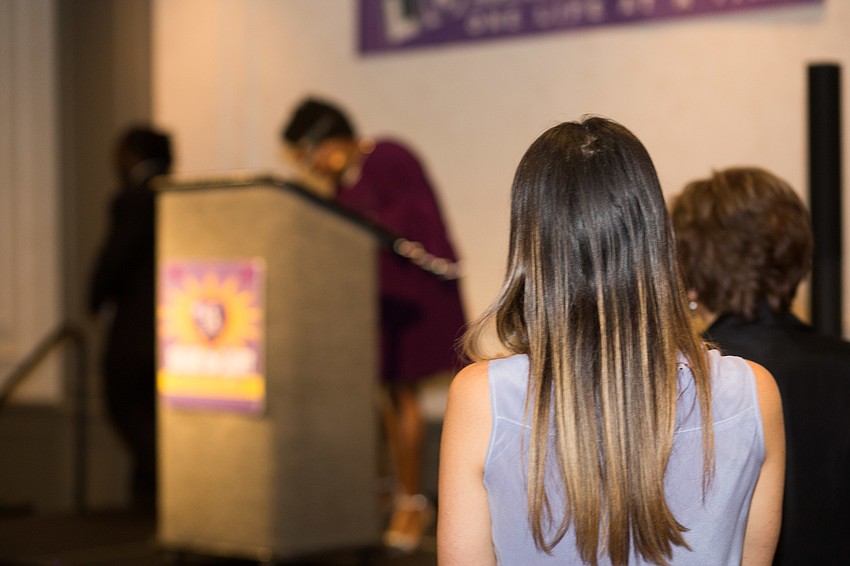 The guests gave April Glasco a standing ovation when she walked on stage.