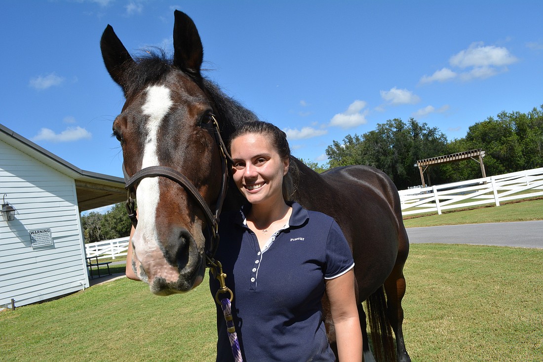 Lauren Golino walks Fiona, one of three animals Cavalli Creek Farm is using for the Special Olympics riding program.