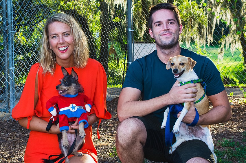 Tessa Nagle with her pooch Winnie and Josh Horne with his buddy Luke Skybarker.