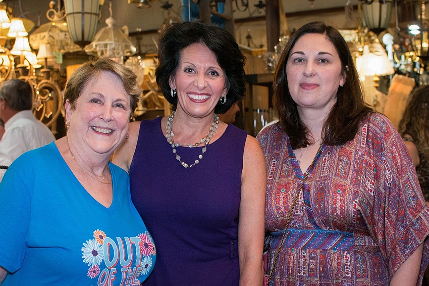NAMI Sarasota County Board of Directors member Linda Stone, Michelle Kapreilian and Carla Johanns