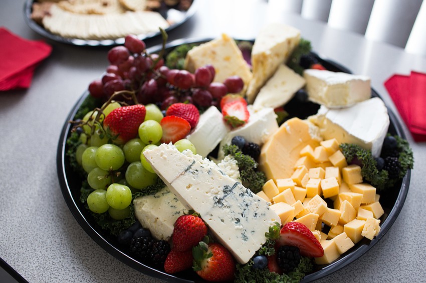 A cheese tray was available for guests to snack on as they listened to the speakers.