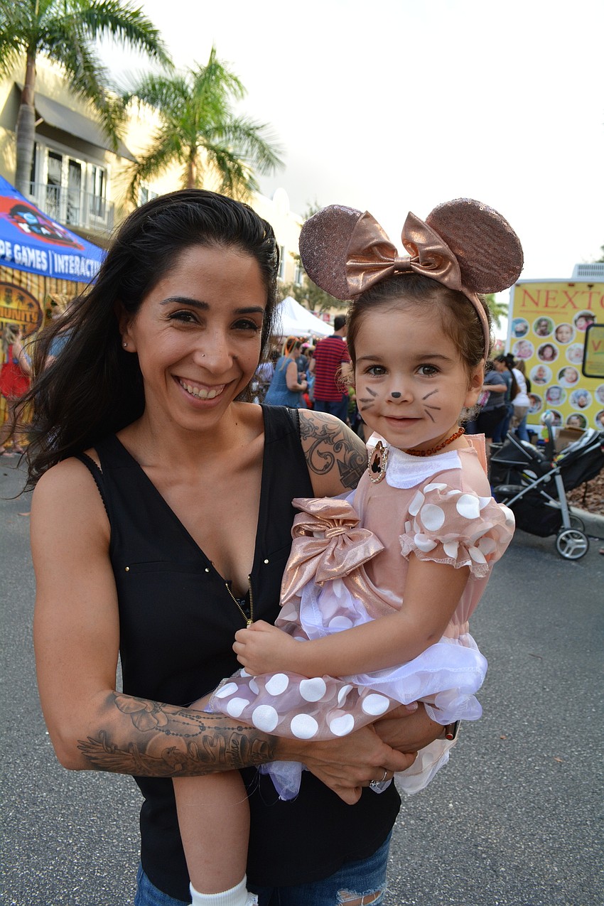 Dressed as Minnie Mouse, East County 2-year-old Layla Wormley, pictured with her mom, Ashley, was on the hunt for kids in dinosaur costumes. 