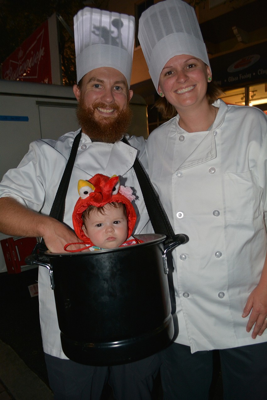 Jeremy and Megan Rollins, of Ellenton, cook up fun — and cuteness — by bringing 5-month-old Skyler as a lobster.