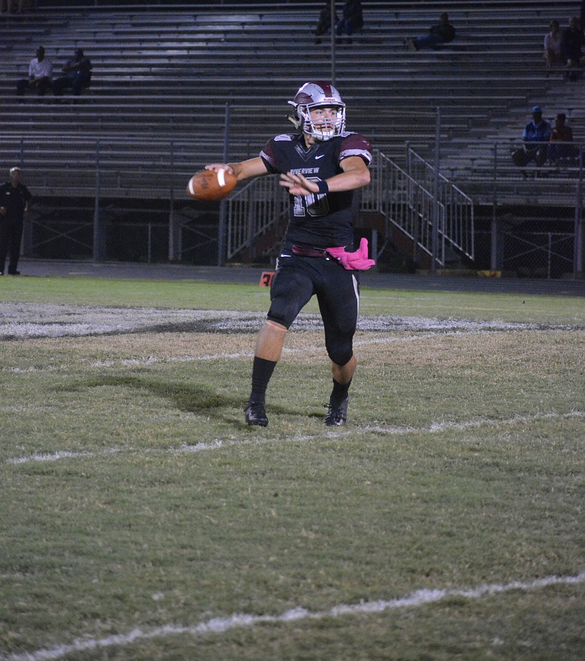 Junior QB Sean White readies to fire a pass.