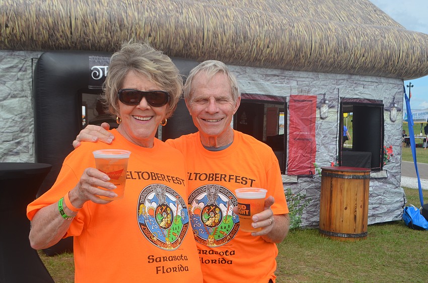Greenbrook's Ron and Ev Turner are volunteers at the event serving beer, but had a quick second to drink some themselves during their break.