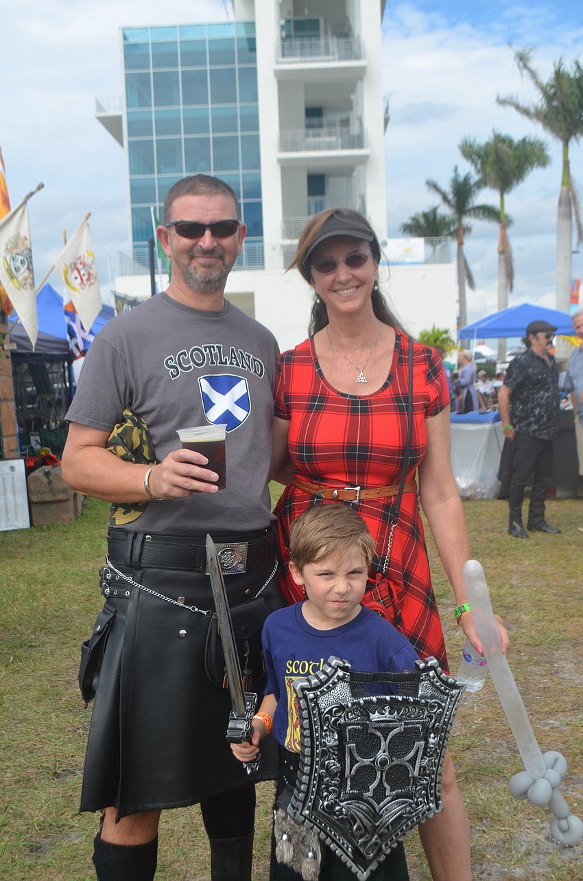 Osprey's John Stanley, Lisa Gardner and Austin Gardner, 7, wore their Celtic apparel.
