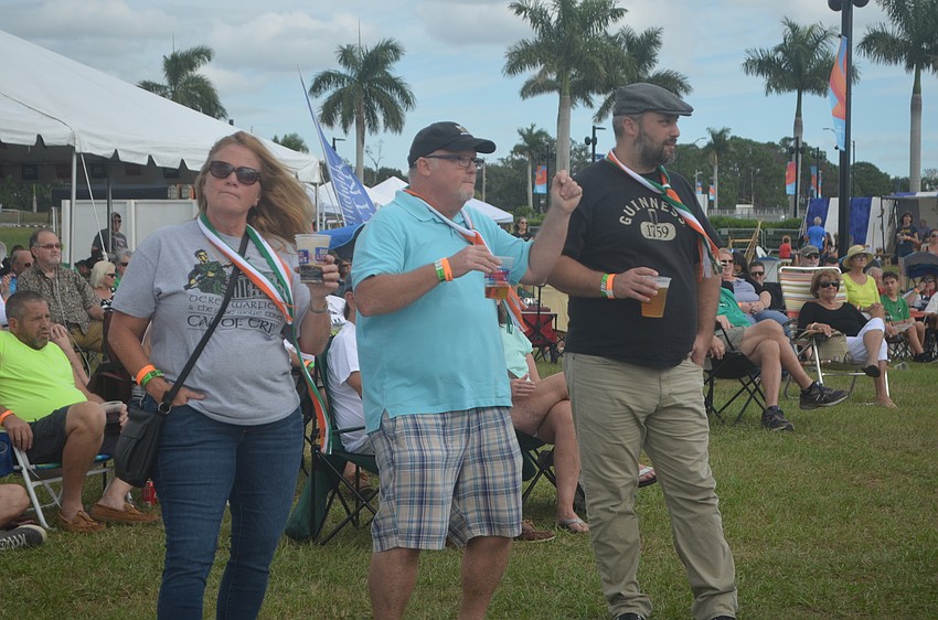 Tampa's Suzanne Goode, Mathew Baker and Adam Gelmi say they drove down to Benderson Park to hear Derek Warfrield and the Young Wolf Tones.