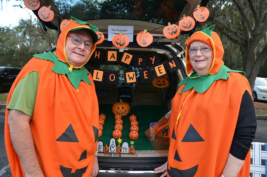 John and Marlene Saum brought out their own little pumpkin patch to decorate their vehicle.