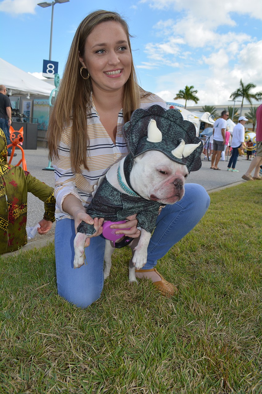 Olivia Barnes entered her dog, Courtney Benson, into the costume contest. She was No. 51.