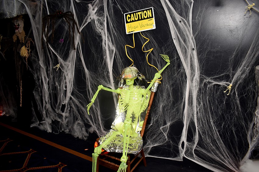 As guests arrived, they had to wind through a haunted hallway to get to the party.