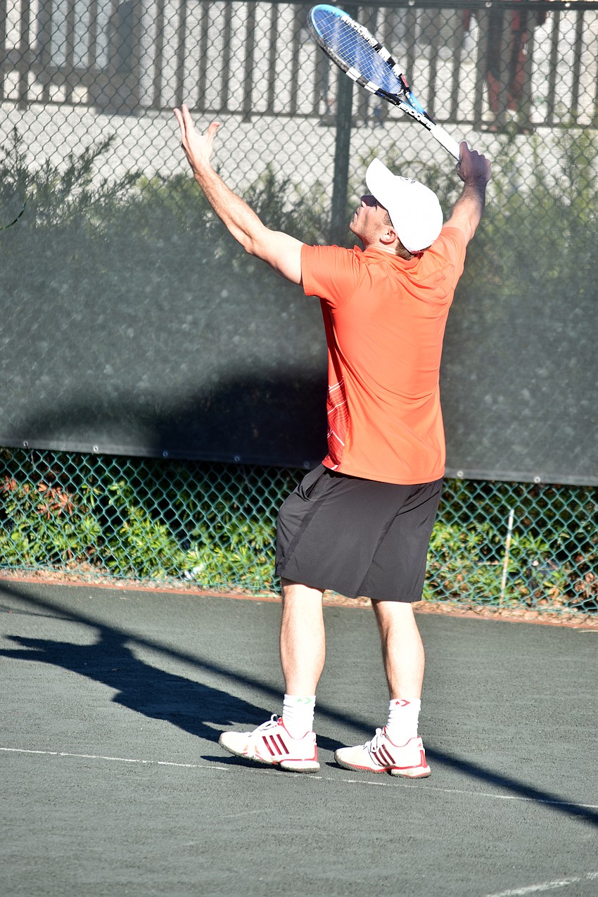 Chris Hincker serves the ball during a semifinal match.
