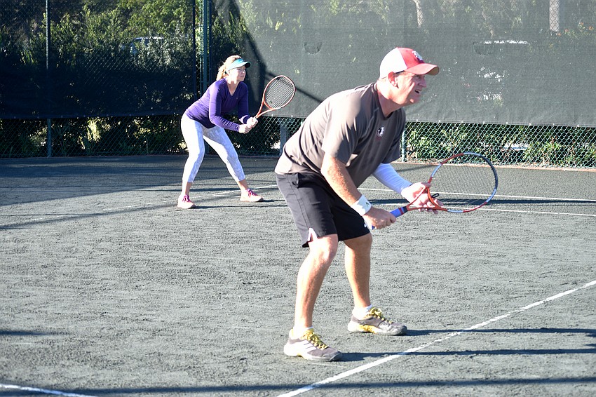 Tatiana Solclatova and Scott Schurieman compete in a semifinal in the open mixed division.