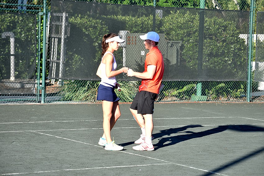 Abby and Chris Hincker strategize during a semifinal in the open mixed division.