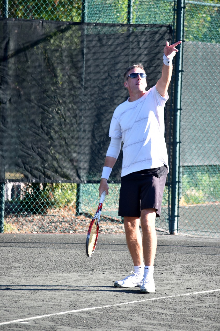 Nick Hardy gets ready to serve the ball during a final match.