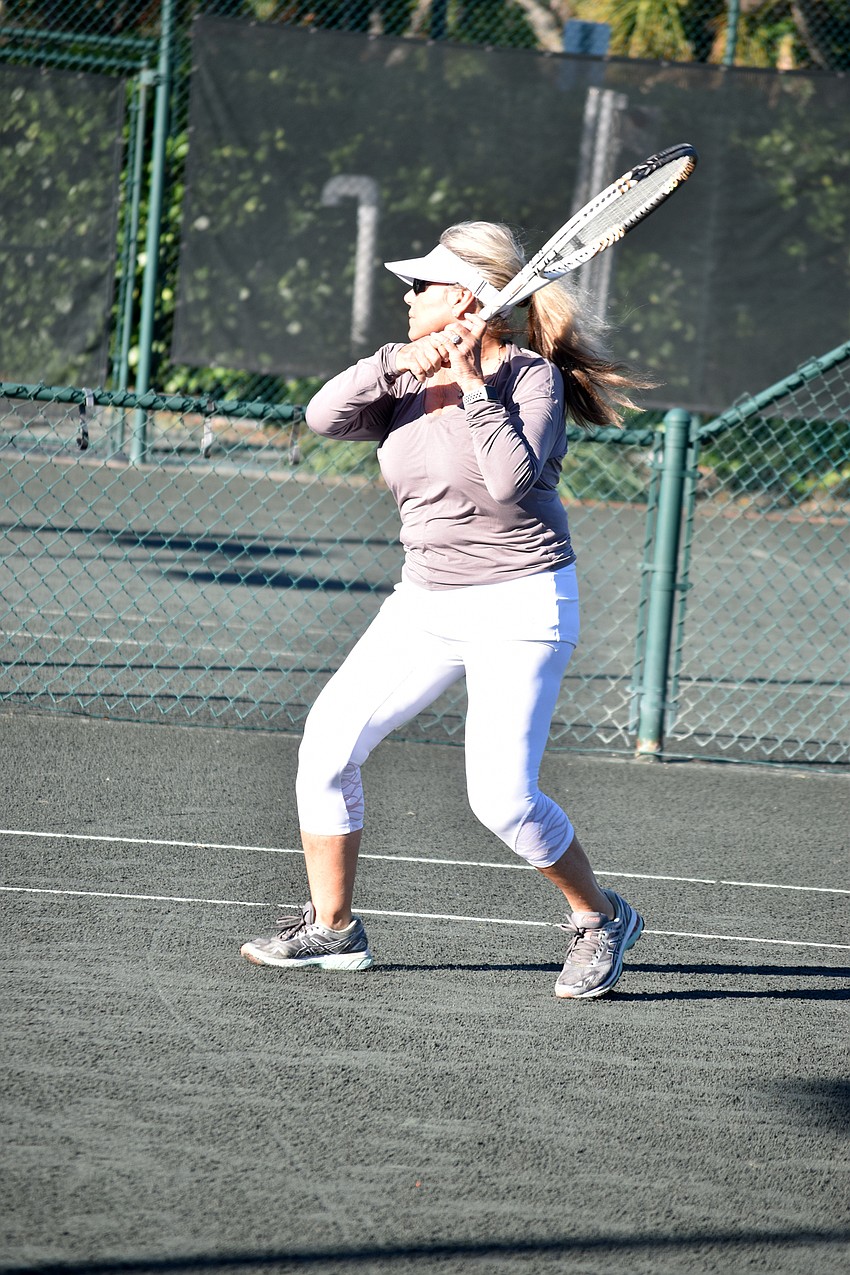 Barbara Lancer competes in a final match.