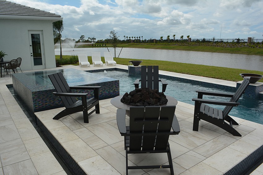 The Solana Caribbean model includes a fire pit next to the pool.