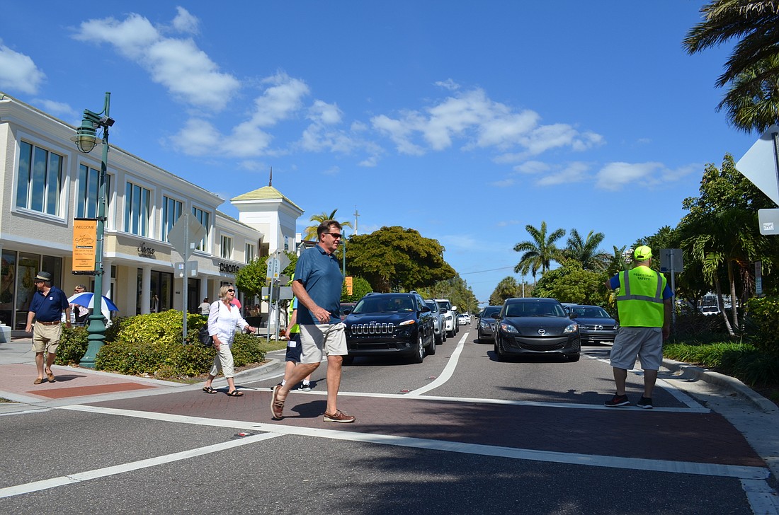 Platooning pedestrians in the St. Armands Circle crosswalks, with the help of a crossing officer, is one of the proposals supported by Longboat leaders.