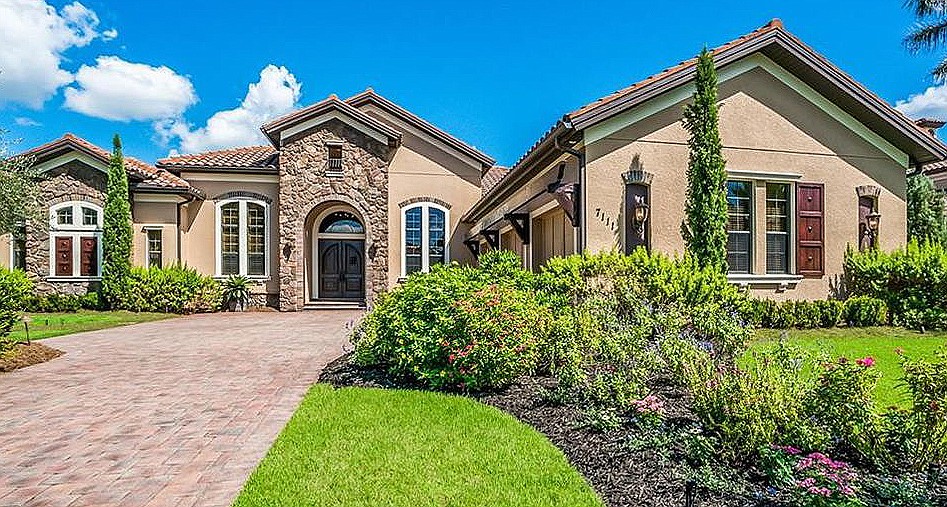 The Country Club Village home at 7111 Teal Creek Glen recently sold for $1,194,000. Built in 2008, it has four bedrooms, five baths, a pool and 4,963 square feet of living area.