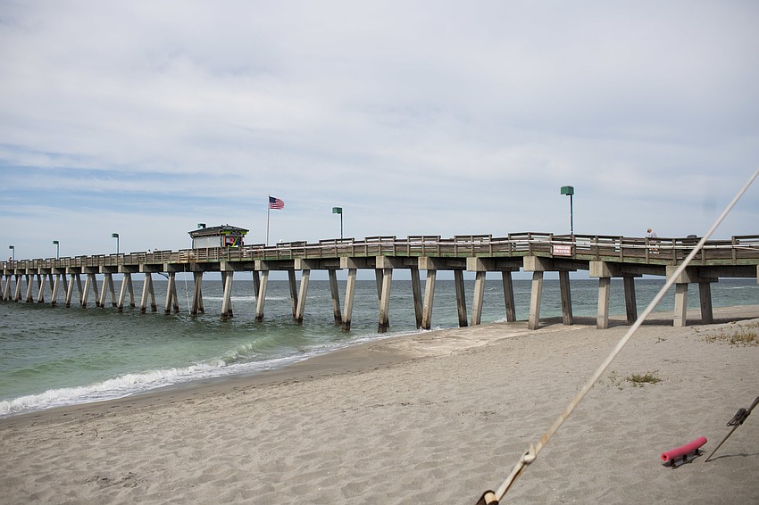 The luncheon and fashion show was hosted on the beach.