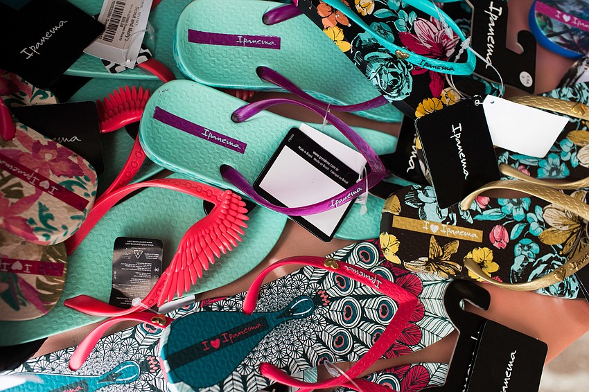 Guests had a chance to win a pair of flip flops by filling out the chance drawing card at their seat.