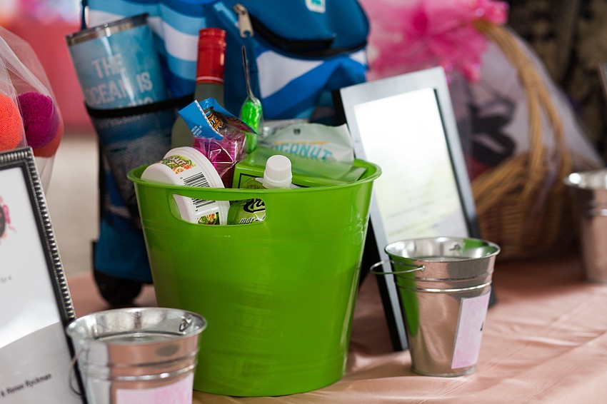 Guests could purchase chance drawing tickets to win prizes such as this margarita bucket.