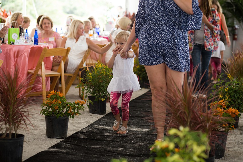 Children First kids walk the runway in clothes from Debbie Dannheisser Threads.