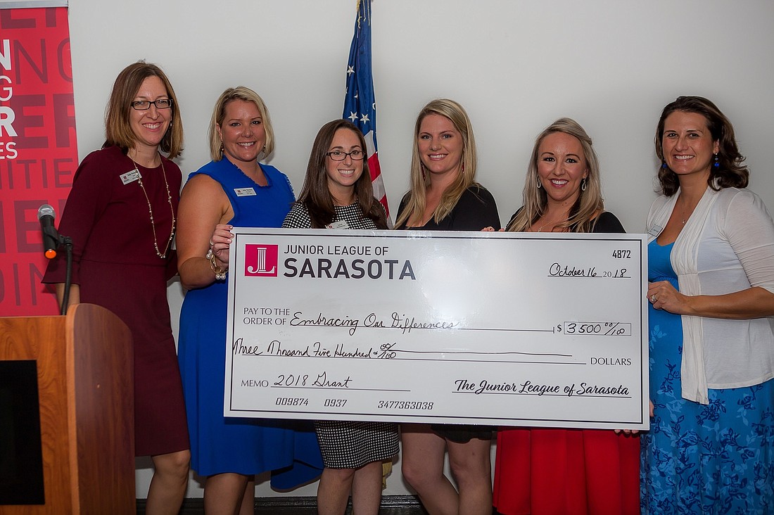 Sarah Wertheimer accepts the $3,500 grant check from Junior League of Sarasota. Courtesy photo
