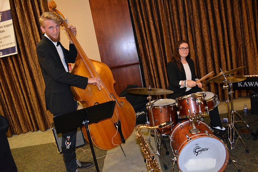 Guests enjoy live music as they gambled and bid on silent auction items.