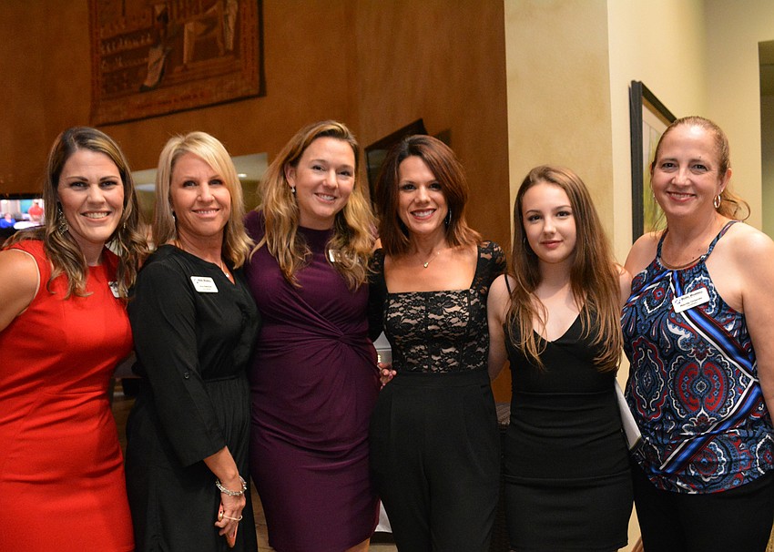 Foundation board members Christina Goldberg and Gina Babcock, Kristin Wolfrum pose with Foundation founder Melissa Wandall and her daughter, Madisyn, and foundation coordinator Wendy Orlando.