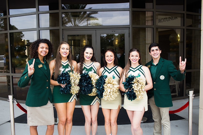 USF ambassadors, cheerleaders and dancers welcomed guests to the campus.