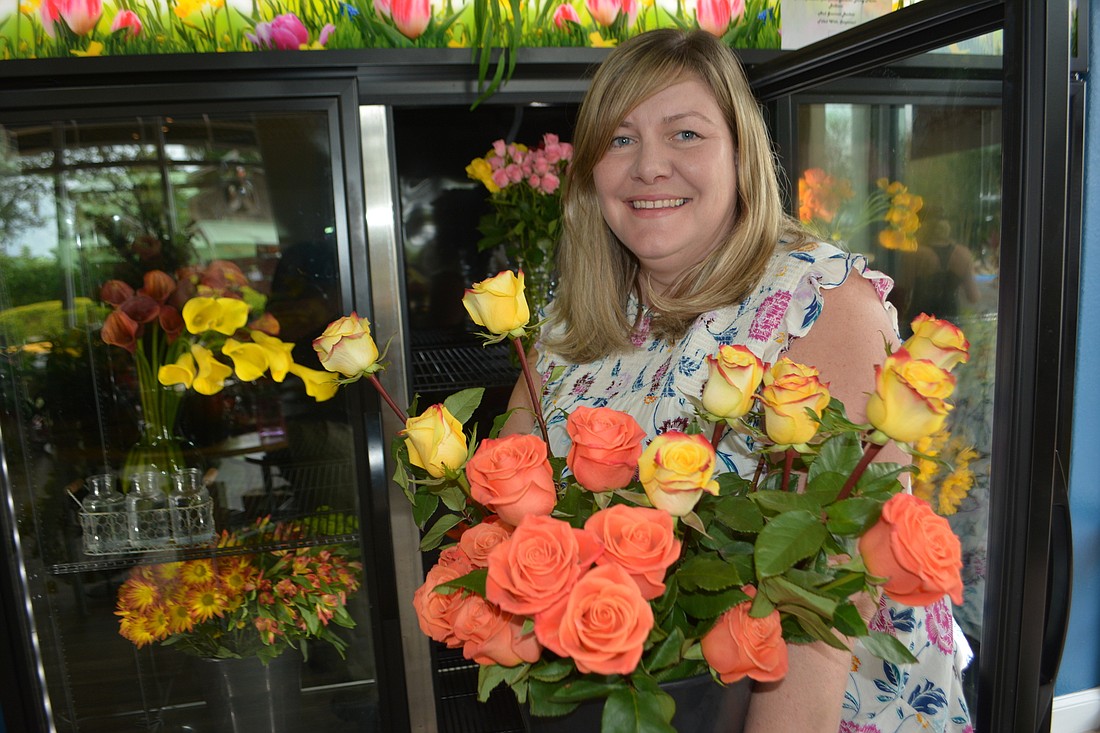 Michelle Bridges is the new owner of Fantasy Flowers at 8111 Lakewood Main Street, Suite 101.