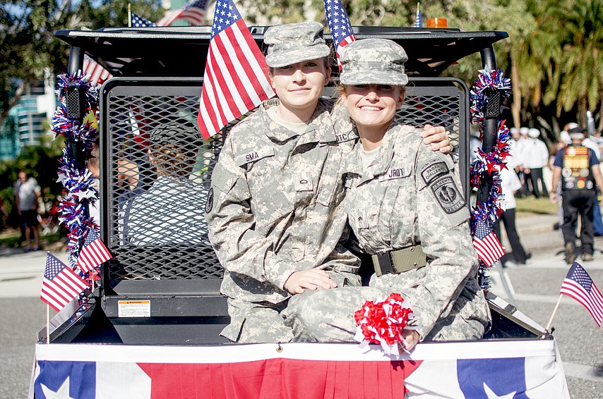 Sarasota Military Academy students Carlie Murphy and Juliana Rendle wait for the parade to begin at the corner of Osprey Avenue and Main Street during the 2017 Veterans Day Parade. File photo.