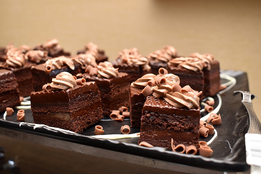 After lunch, the players enjoyed various desserts, chocolate ganache cake.