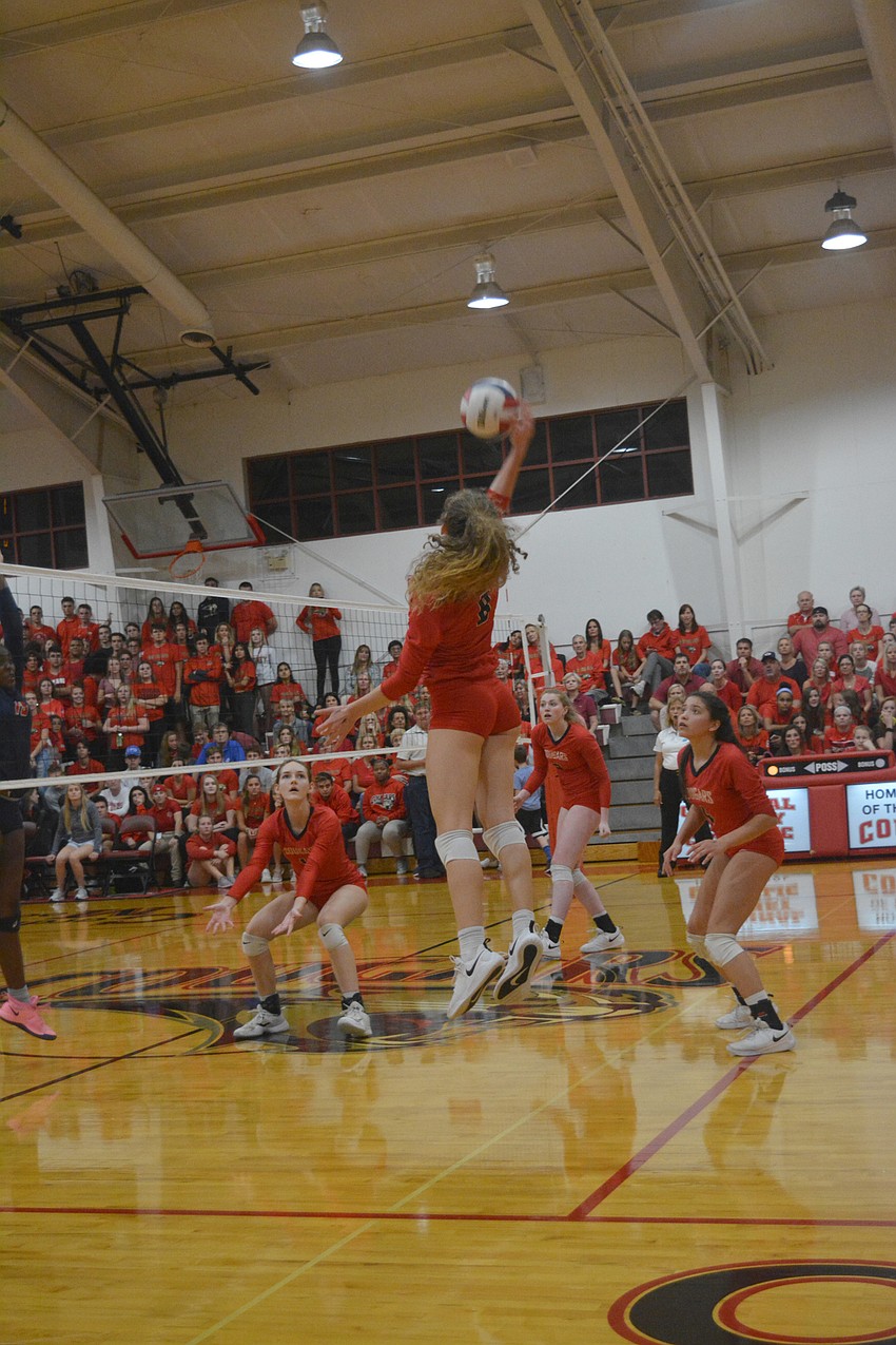 Sophia Hritz fires a kill attempt at Oxbridge Academy's defense.