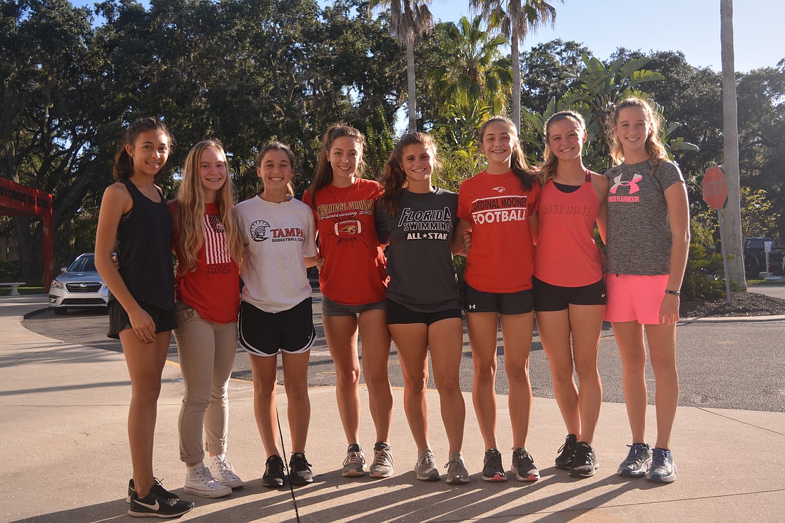Trinity Shipe, Avery Blechta, Natalie Mercadante, Zoie Zanoni, Jenna Santiago, Madison Smithers, Hallie Monserez and Rachel Jarrett have led the Cougars girls cross country team to the state championship.