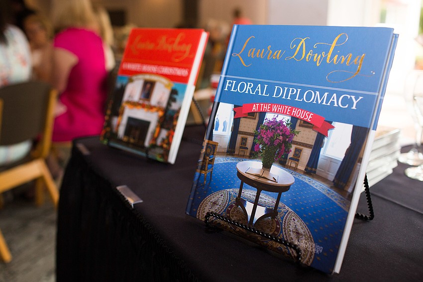 Two of Laura Dowling's books were for purchase, and Dowling autographed them after the presentation.