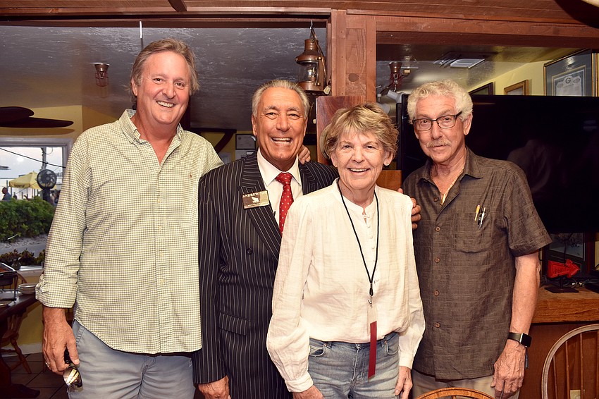 Previous Chamber Chairman Mike Doll, Andrew Vac, Sandy Tull and Tim Field