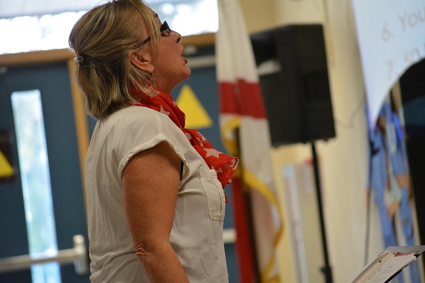 Music teacher Barbara Siffermann loves teaching traditional patriotic songs to the children.