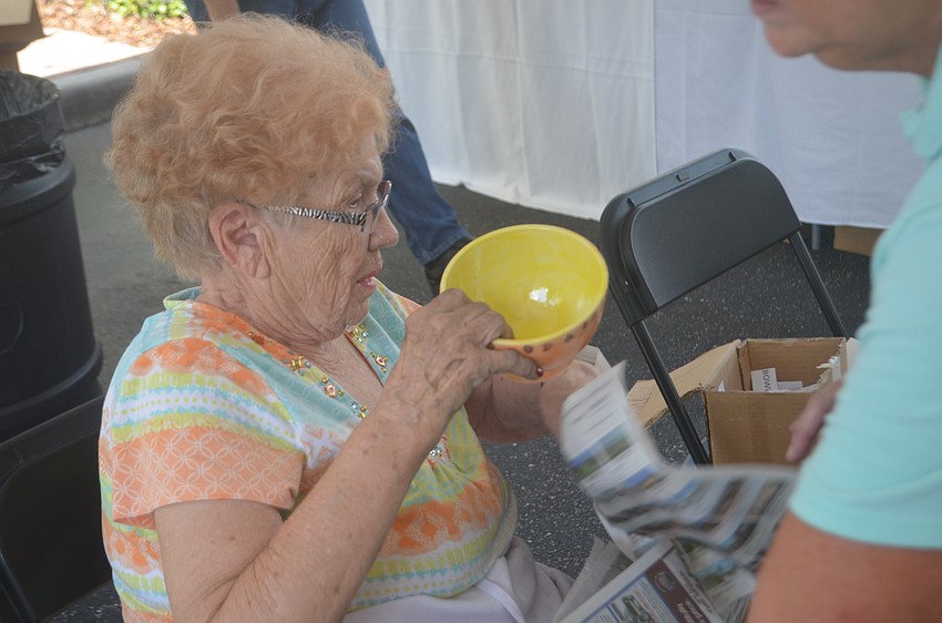 Bradenton's Mary Meyer is an expert at wrapping bowls to take home. She has wrapped every bowl for Empty Bowls for the last four years, and has only ever dropped one.