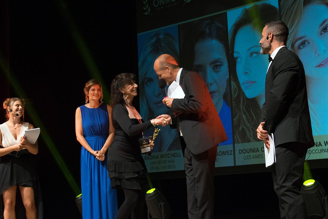 Carolyn Michel is awarded Best Actress of the Year at the Oniros Film Awards in Aosta, Italy. Courtesy photo