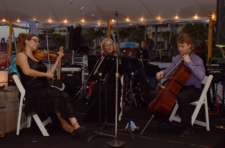Live music wafted throughout the tent during the stone crab and winemaker dinner.