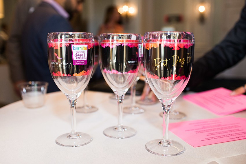 Themed wine glasses were for sale.