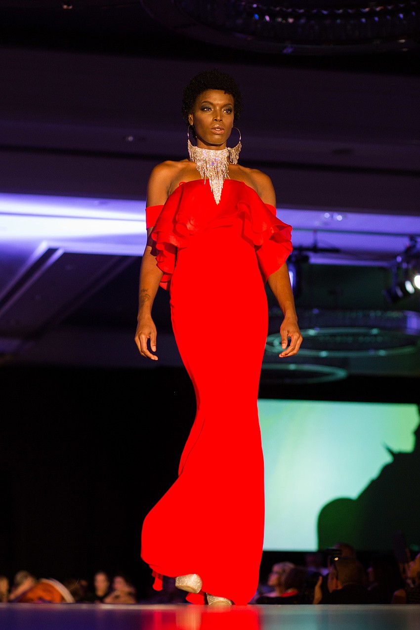 Models walk the runway during the  Night Beat section of The Met Fashion show.