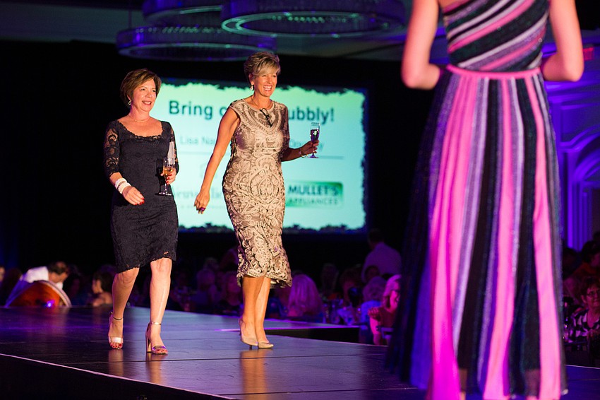 Wine Co-Chairwomen Dawn Doughty and Lisa Napolitano are introduced.